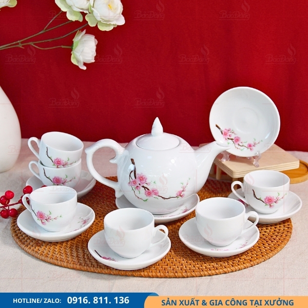 bo-am-chen-su-trang-in-hoa-dao-dang-buoi-lua-tet-qua-tang bộ ấm chén sứ trắng in hoa đào dáng bưởi lửa tết quà tặng