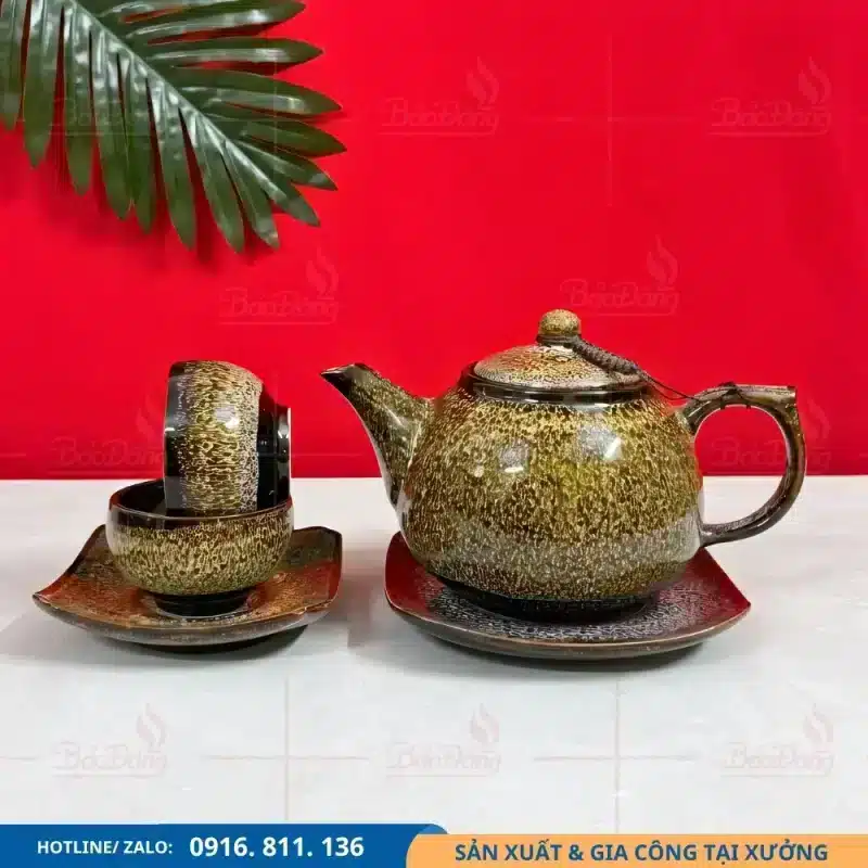 Bộ ấm chén dáng Tây Thi hỏa biến gấm vàng, thiết kế tinh tế