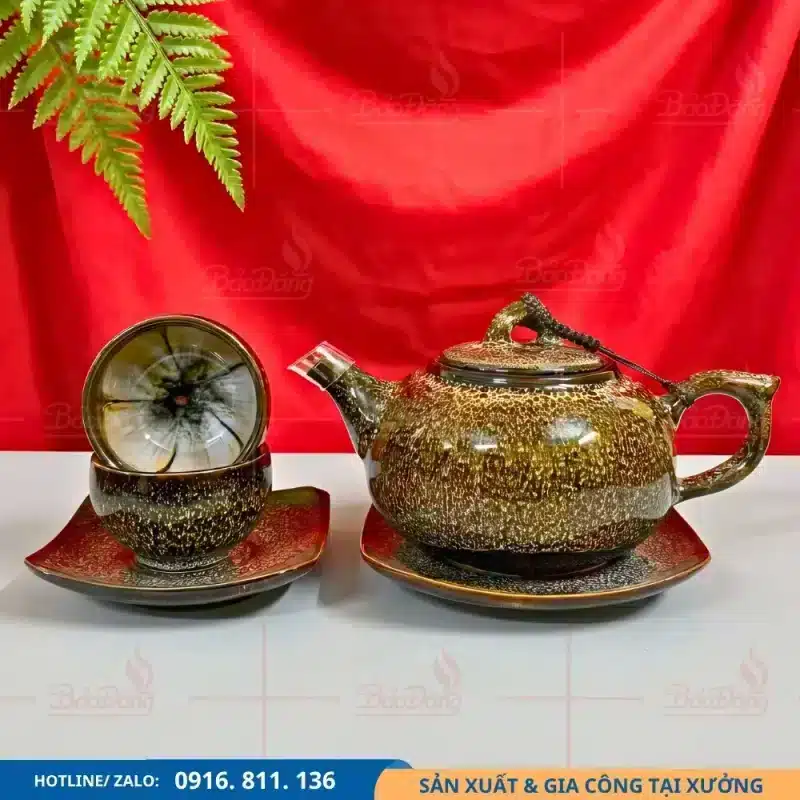 Bộ ấm chén hỏa biến dáng gốc cây gấm vàng đầy nghệ thuật
